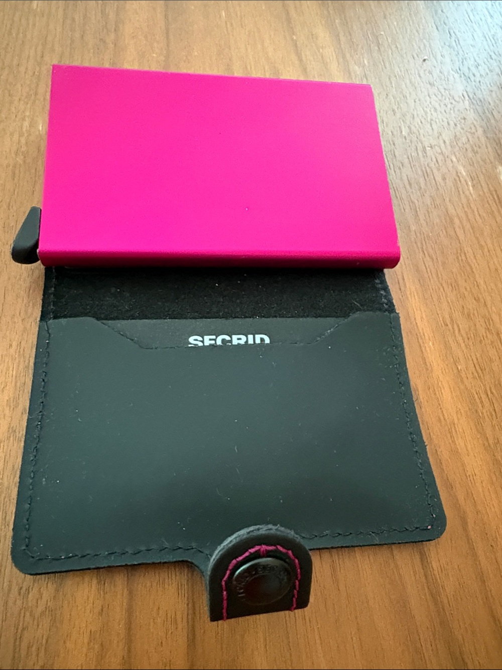 Secrid Slimwallet in Hot Pink with Black Leather Sleeve
